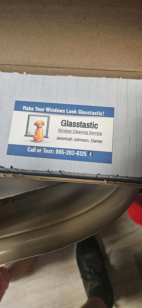 Glasstastic Window Cleaning business cards inside box featuring cartoon dog logo and tagline “Make Your Windows Look Glasstastic,” printed by WCR Marketing.