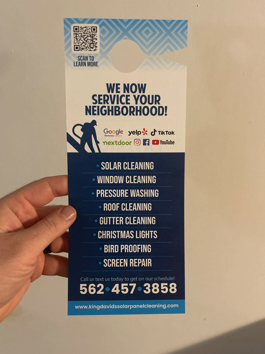 Doctor Pane Window Cleaning door hanger back side showing detailed service pricing list and customer review, printed by WCR Marketing.