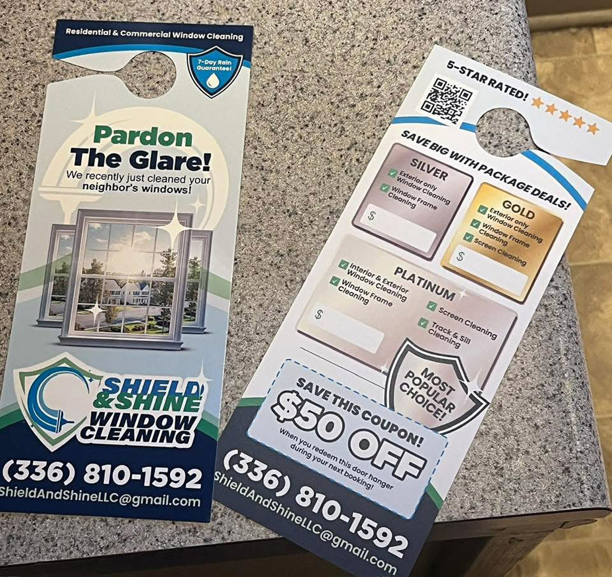 Shield and Shine Window Cleaning door hanger front side reading “Pardon The Glare,” advertising residential and commercial cleaning, printed by WCR Marketing.