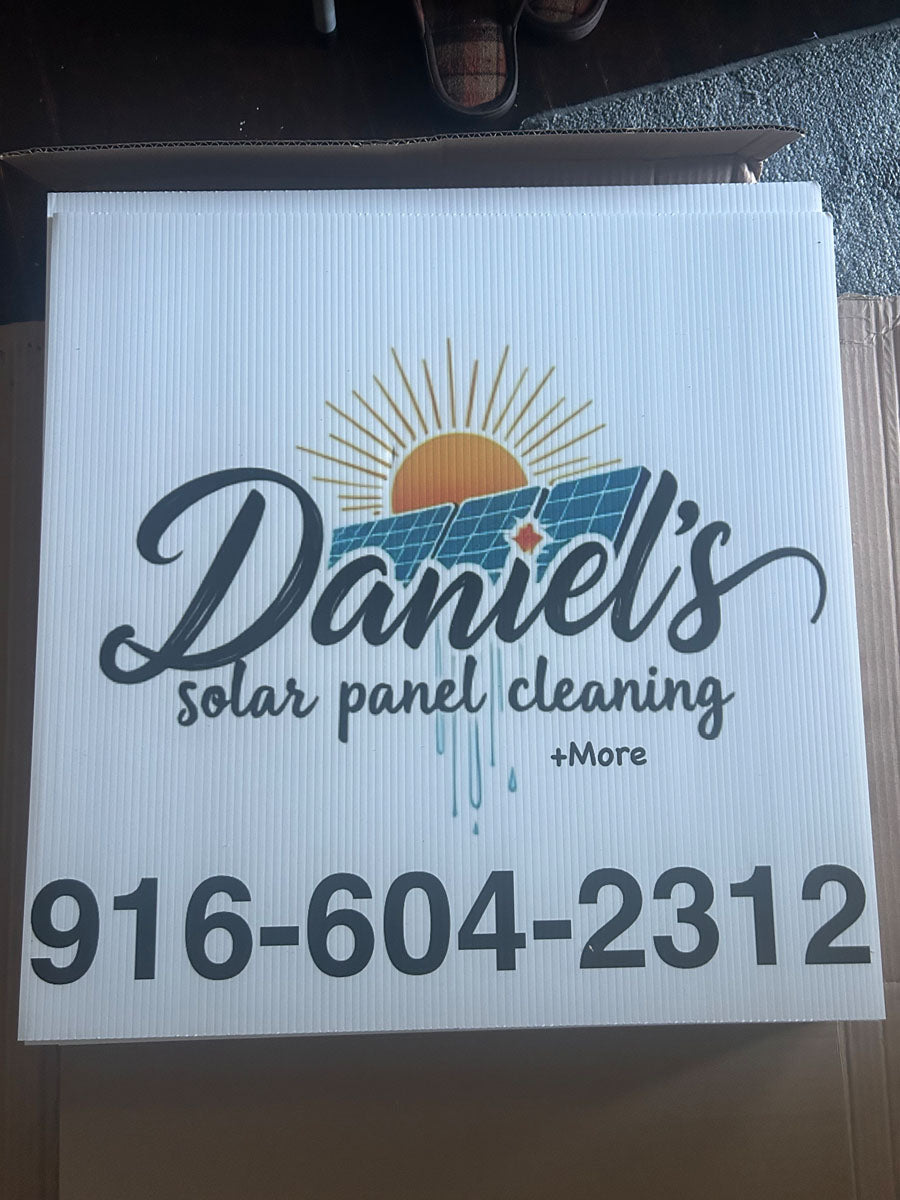 Solar panel cleaning yard sign for Daniel’s Solar Panel Cleaning featuring sun and panel graphic with bold phone number, printed by WCR Marketing.
