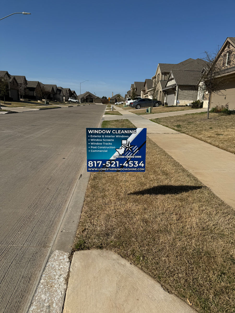 Window cleaning yard sign for Lone Star Window Shine displayed in a suburban neighborhood with clear blue sky, printed by WCR Marketing.