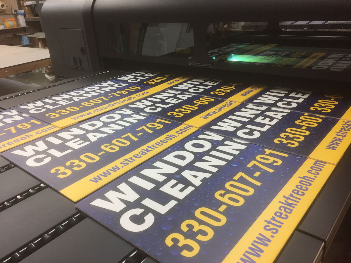 Perfect Panes Cleaning yard sign with Dirty Windows message displayed in front of residential home, printed by WCR Marketing.