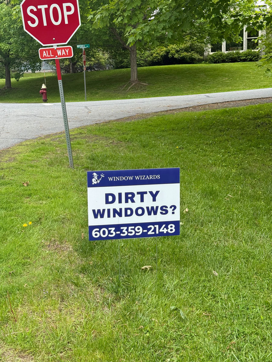 Dirty Windows yard sign for Window Wizards displayed on residential lawn with tree-lined background, printed by WCR Marketing.