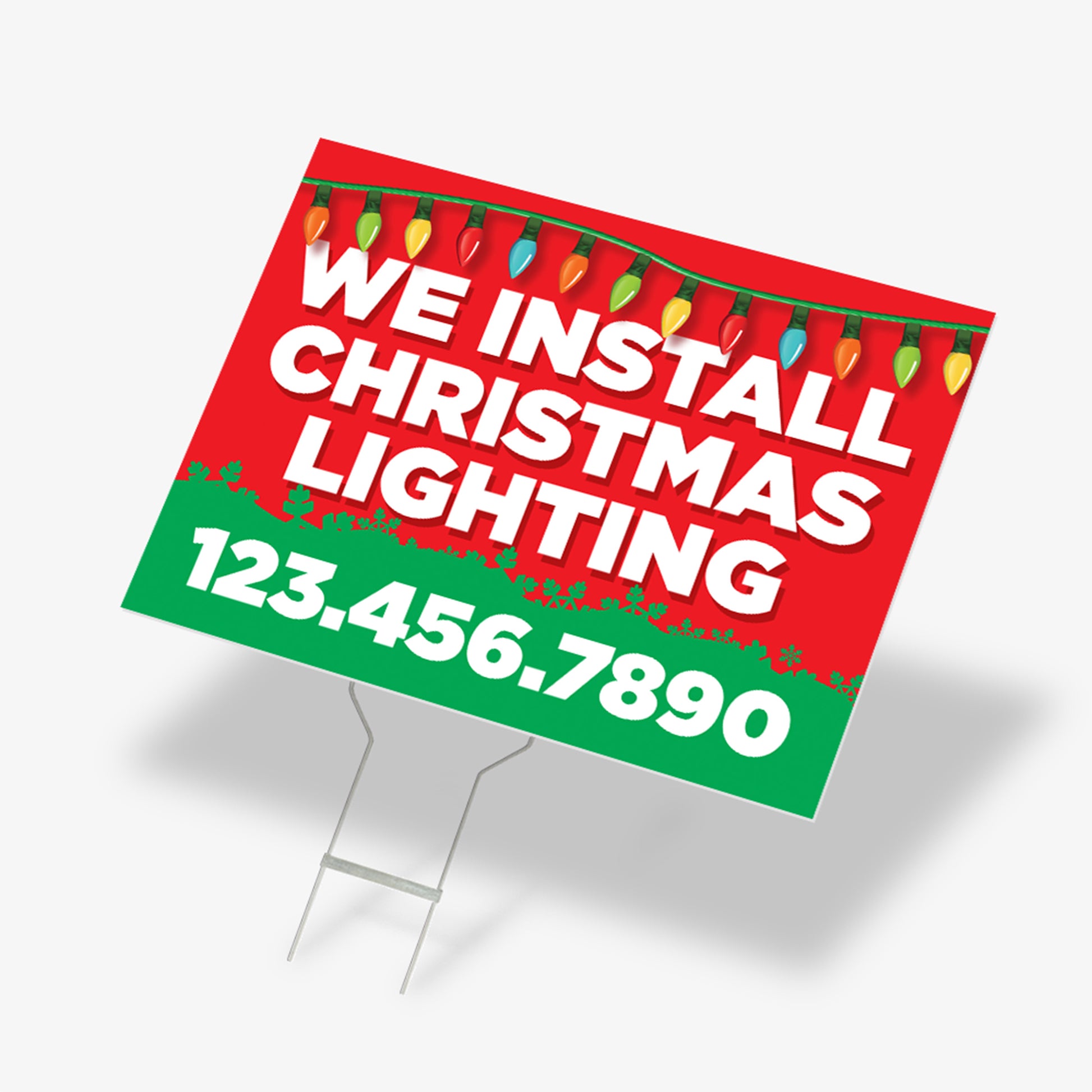 Red and green Christmas lighting yard sign with multicolor lights and “We Install Christmas Lighting” message